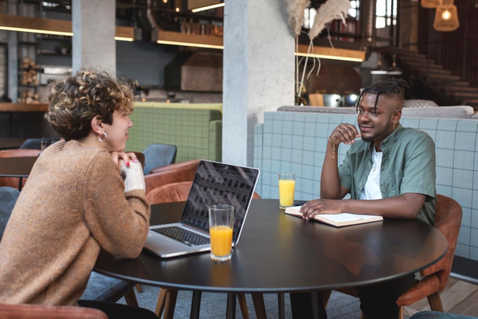 Business team analyzing financial reports and discussing strategies in a modern office setting